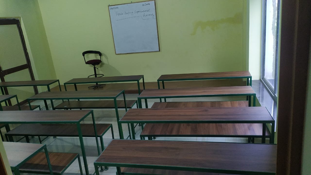 SIIHMC classroom with housekeeping session in progress